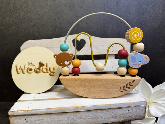 Gioco con perline in legno Montessori