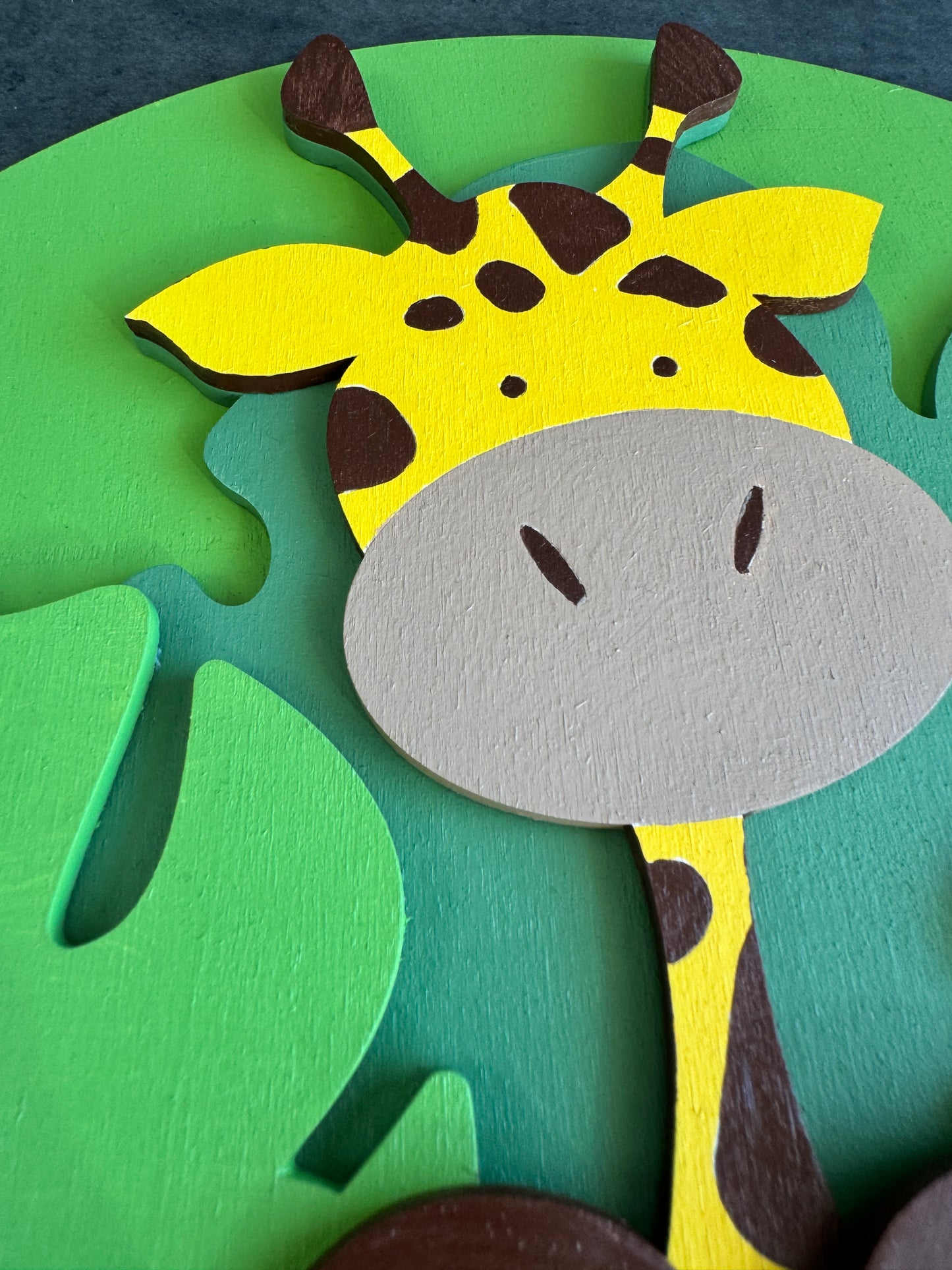 Cerchio in legno 3D con dolce giraffa