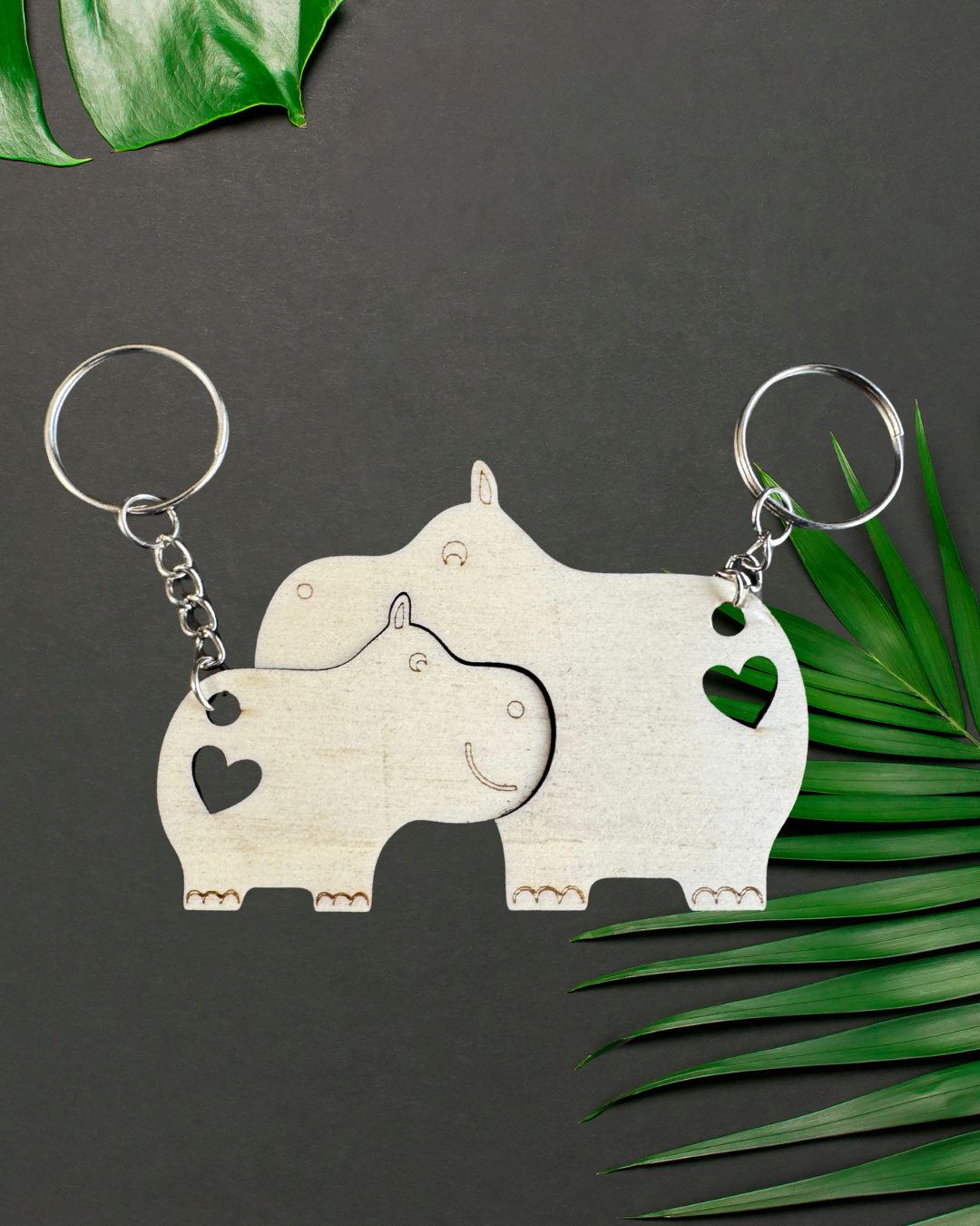 Coppia di portachiavi in legno con animali