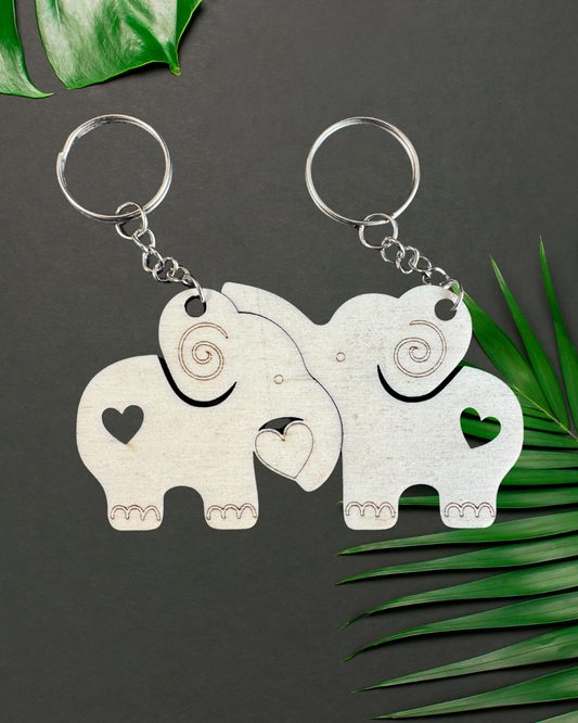 Coppia di portachiavi in legno con animali